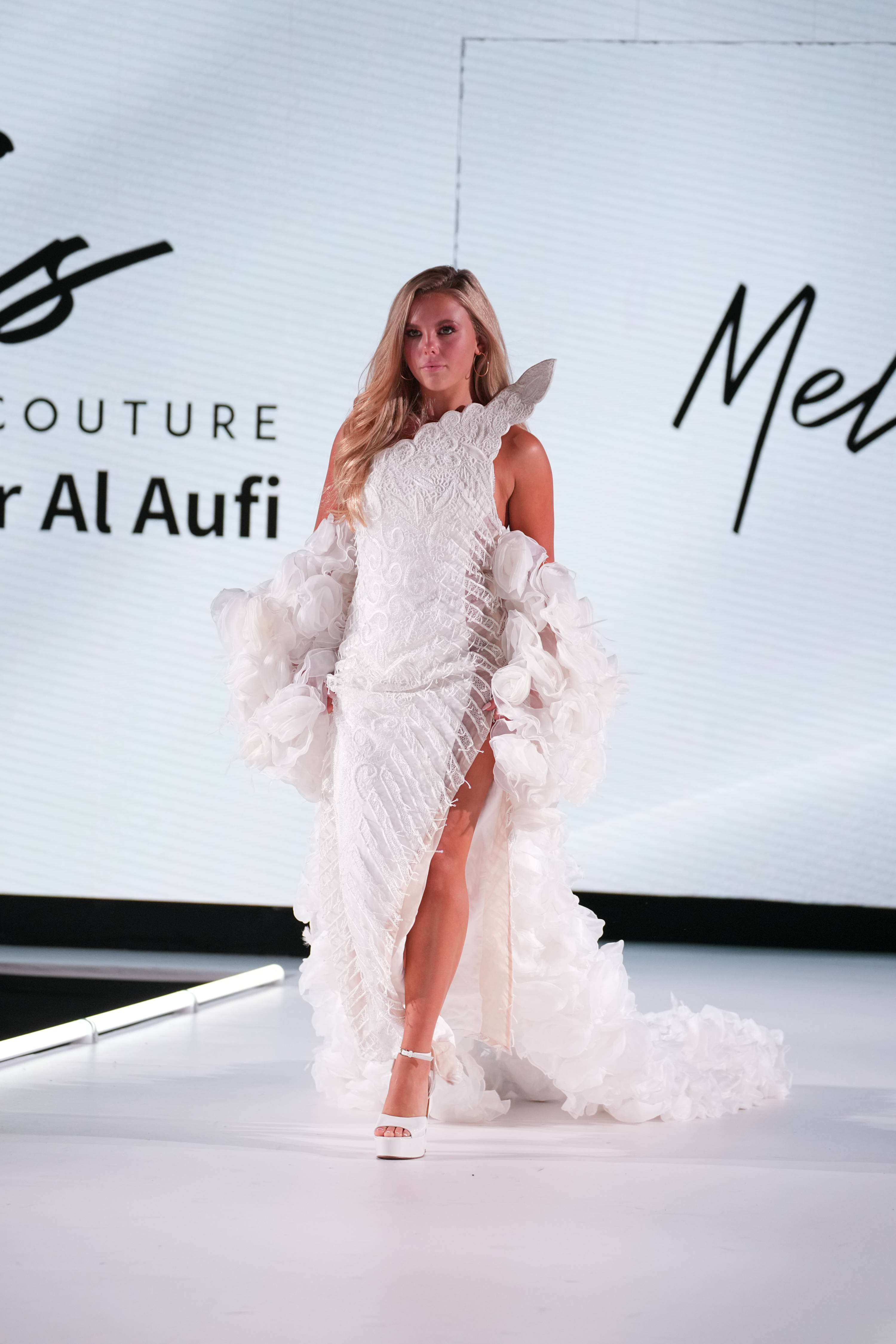 ASYMMETRICAL LACE GOWN WITH FLORAL TRAIN