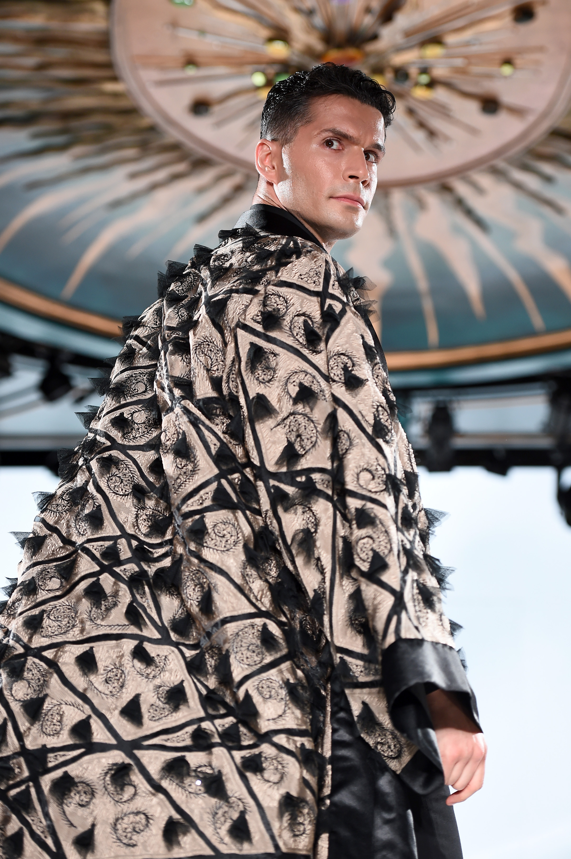 BLACK SUIT WITH EMBROIDERED LUXURY CAPE