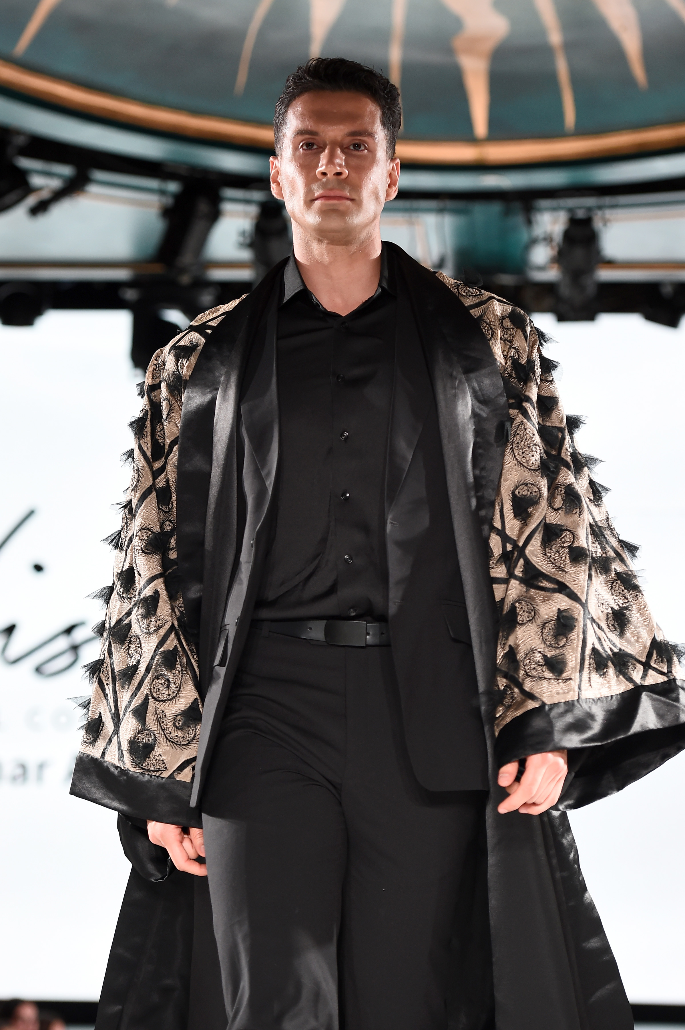 BLACK SUIT WITH EMBROIDERED LUXURY CAPE