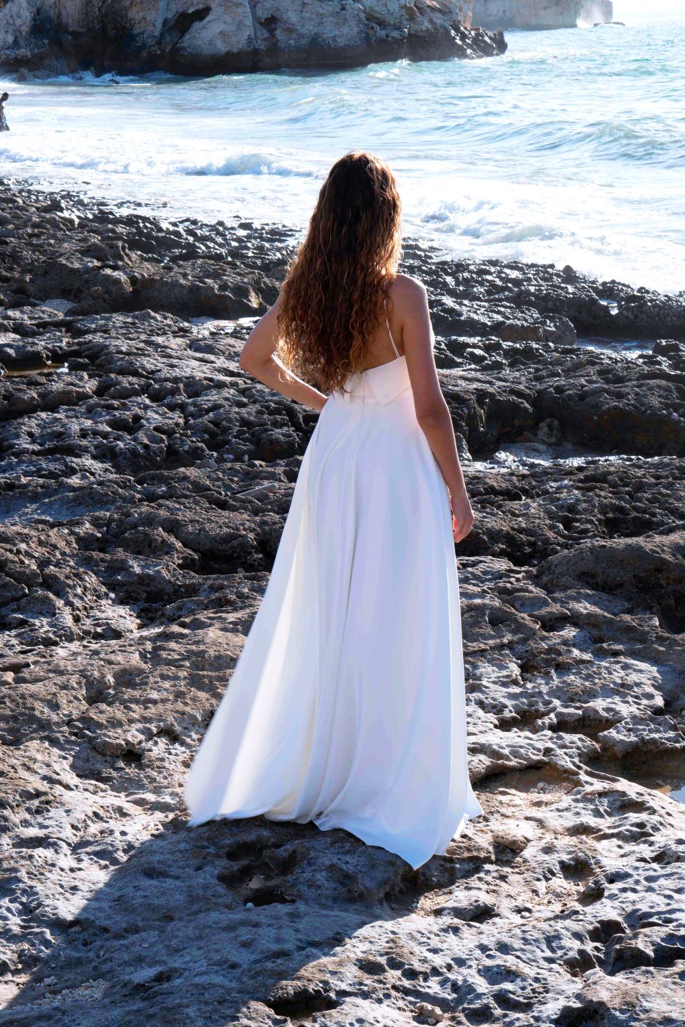 CROSS-HALTER FLARE SATIN GOWN